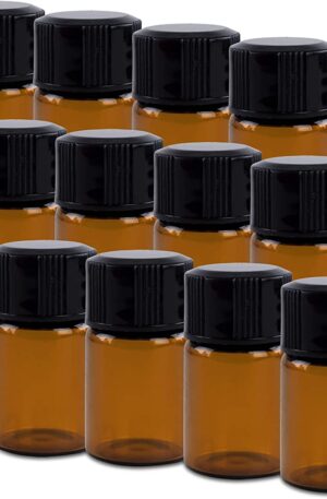 Frascos ámbar de fragancias y aceites esenciales ordenados en fila